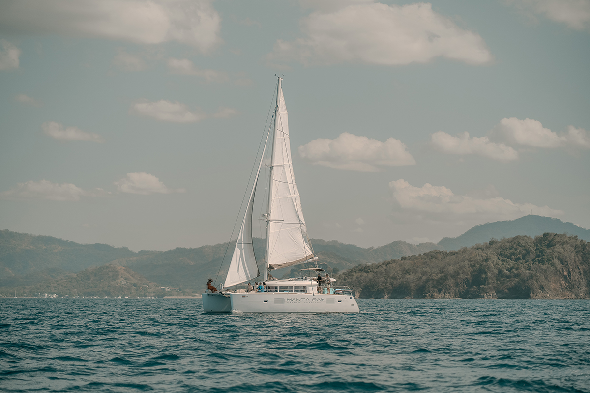 Private catamaran sailing